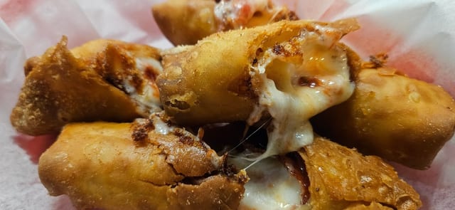 Fried pepperoni & cheese eggroll.